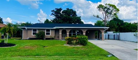 Photo of 1490 Yorkshire Street, Port Charlotte, FL 33952 (MLS # A4663902)