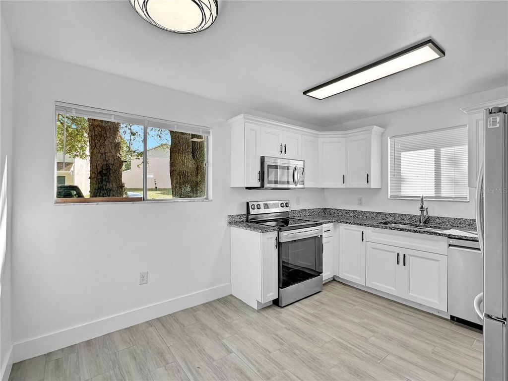 Photo of 4126 Plantation Cove Drive #304, Orlando, FL 32810 (MLS # O6406491)