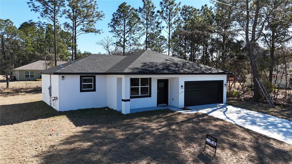 Photo of 7169 N Tallwood Drive, Citrus Springs, FL 34434 (MLS # O6350874)