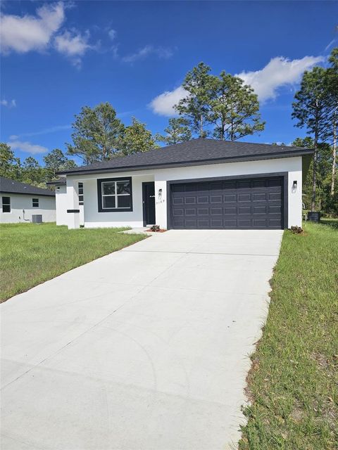 Photo of 7169 N Tallwood Drive, Citrus Springs, FL 34434 (MLS # O6350874)