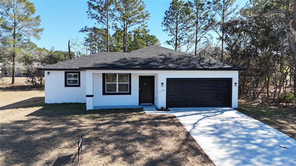 Photo of 7169 N Tallwood Drive, Citrus Springs, FL 34434 (MLS # O6350874)