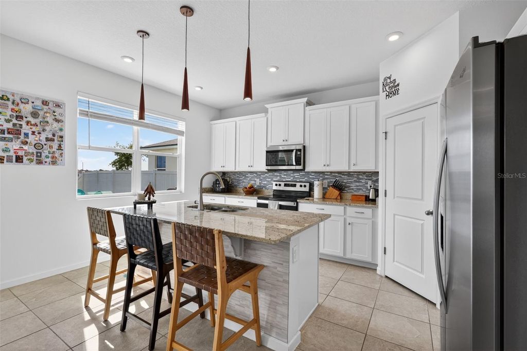Photo of 1181 Lakeshore Breeze Place, Kissimmee, FL 34747 (MLS # O6399978)