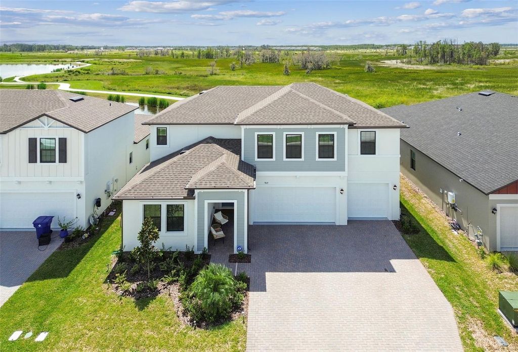 Photo of 9645 Runaway Breeze Drive, Land O Lakes, FL 34637 (MLS # TB8428952)