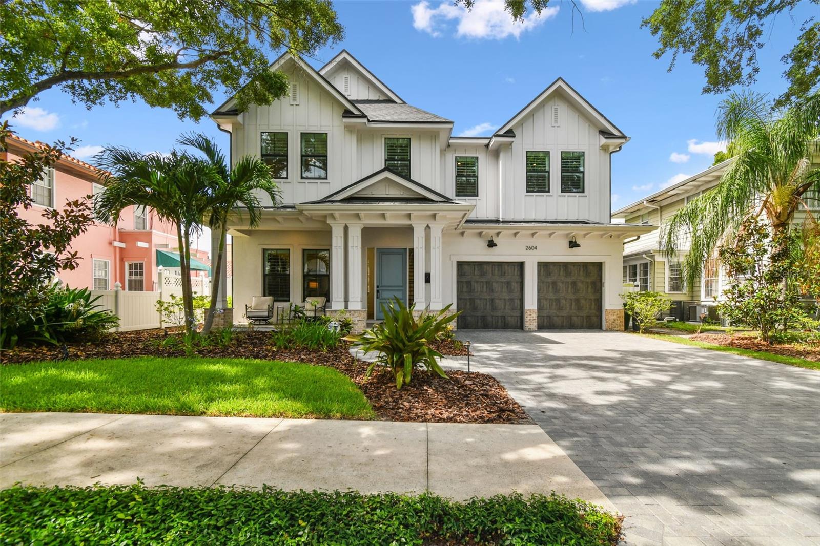 Step into luxury with this stunning 3,712-square-foot, two-story home built in 2020 by Taralon Homes. Offering four spacious bedrooms, four full bathrooms, an office and media room, this meticulously designed property sits on a 58x108.5 lot and features a three-car tandem garage. Inside, refined craftsmanship shines with crown molding and 7.5" plank maple wood floors throughout. The living room’s gas log brick fireplace and sliding doors to the back patio create an inviting atmosphere, while a 5.1 surround sound system in both the living and game rooms adds to the entertainment experience. The chef-inspired kitchen is equipped with a Wolf dual-fuel range, Subzero refrigerator with cabinet panels, a center island with a farm sink and pull-out trash, quartz countertops, soft-close maple shaker-style cabinets with under cabinet lighting, and a butler’s pantry featuring a dry bar and wine fridge. A breakfast nook and eat-in island space provide convenient dining options with easy access to the screened lanai. The first floor also has an office, formal dining room, and a full pool bath. It would be easy to add a 5th bedroom downstairs connected to the bath by converting the tandem 3rd car garage space. The second floor boasts an insulated media room with 5.1 surround sound, an expansive primary suite featuring two walk-in closets with custom built-ins, and an elegant primary bathroom with a walk-in shower, freestanding tub, dual vanity with stone countertops, and porcelain tile floors. The additional bedrooms offer walk-in closets, with Bedrooms 3 and 4 sharing a Jack-and-Jill bath, while Bedroom 2 enjoys an ensuite. The large upstairs laundry room is thoughtfully designed with maple shaker-style cabinets, stone countertops, a gas drop for the dryer, a floor drain, and a sink.
Step outside to a screened lanai showcasing a heated saltwater pool with a sun shelf, bench seating, and three fountains, surrounded by Travertine pavers and beautifully landscaped grounds. The outdoor kitchen, equipped with Jentek gas grill, makes entertaining a seamless experience. Situated in Flood Zone X, this home comes equipped with impact-insulated windows, two 15 SEER AC units, and two Rinnai tankless water heaters. Don’t miss out on this rare opportunity to own a home that blends elegance with modern convenience—schedule your showing today!