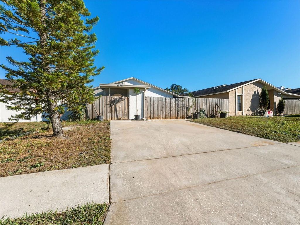 Photo of 10707 Crowngate Lane, Tampa, FL 33624 (MLS # TB8456274)