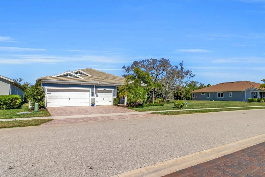 Photo of 5649 Long Shore Loop, Sarasota, FL 34238 (MLS # A4683665)