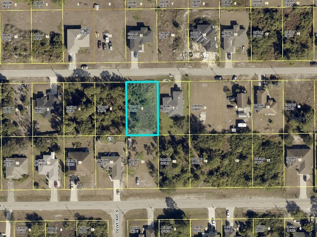 Photo of 3115 39th Street SW, Lehigh Acres, FL 33976 (MLS # C7532244)