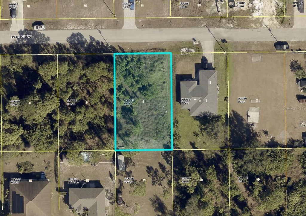 Photo of 3115 39th Street SW, Lehigh Acres, FL 33976 (MLS # C7532244)
