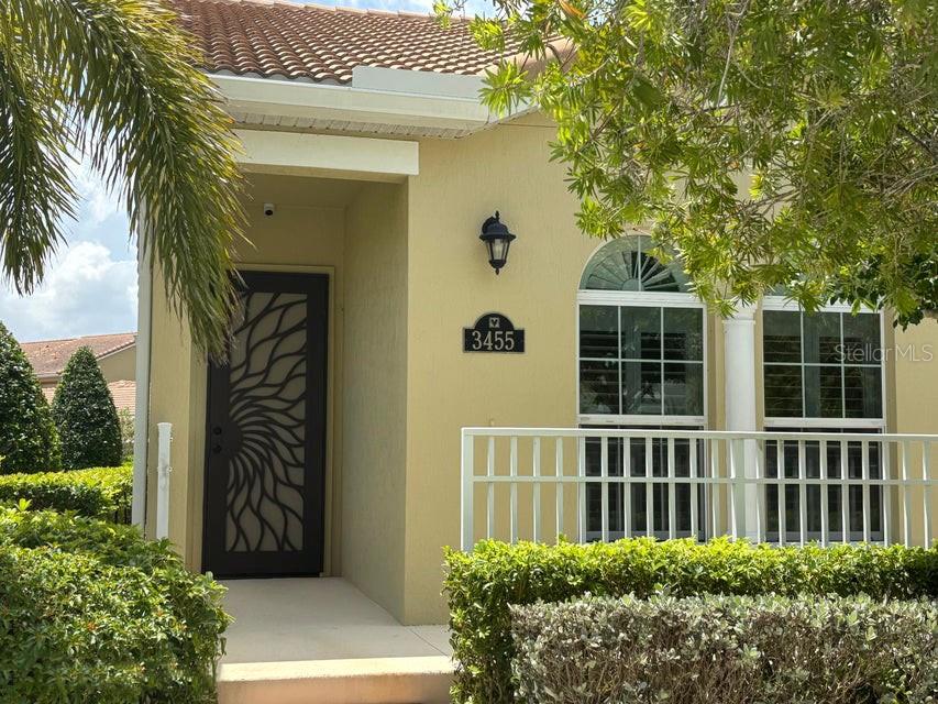 Corner unit, one story townhome in Stadium Villas, a small, friendly conveniently located community in Viera. Meticulously cared-for 2BR, 2BA; oversized 2 car garage with added insulation and floor coating, indoor laundry room, gas range, tankless hot-water heater, plantation shutters, ceiling fans, neutral finishes. Maintenance-free lifestyle-HOA covers exterior landscaping, paint, and roof replacement. Tile roof keeps HOA fees lower longer. Storm/security front door bring the outdoors inside while maintaining your privacy. Four view outdoor cameras and hurricane impact glass for added protection. Spacious primary with walk-in closet and custom California closet system. Flat-screen TVs convey. Plenty of storage and parking; close to community pool, dog park, Publix, the Avenues, banks, restaurants, medical and Government Center. Easy access to I-95, Viera schools, Orlando, Space Center, beaches. A great choice if you are downsizing, starting out, or somewhere in between