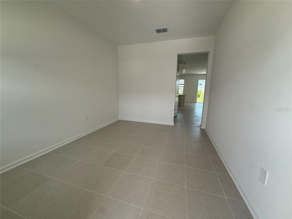 Photo of 2563 Skyline Loop, Kissimmee, FL 34758 (MLS # O6429928)