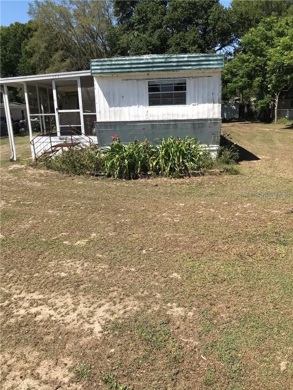 Photo of 274 Sunset Blvd, Polk City, FL 33868 (MLS # TB8490743)