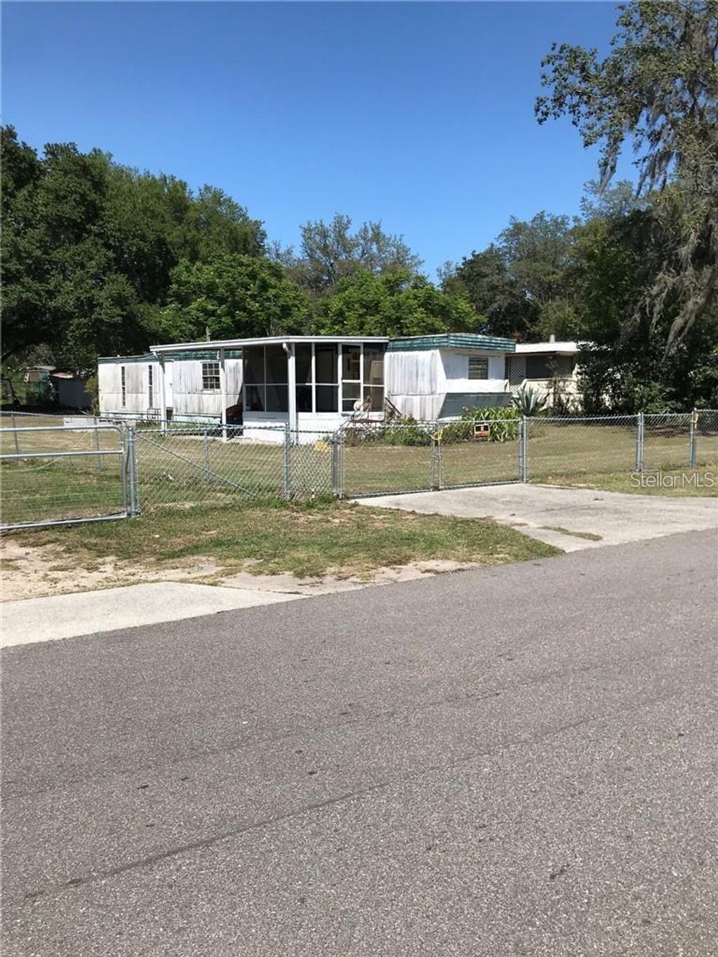 Photo of 274 Sunset Blvd, Polk City, FL 33868 (MLS # TB8490743)