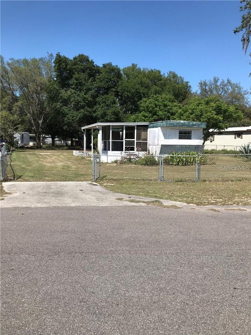 Photo of 274 Sunset Blvd, Polk City, FL 33868 (MLS # TB8490743)
