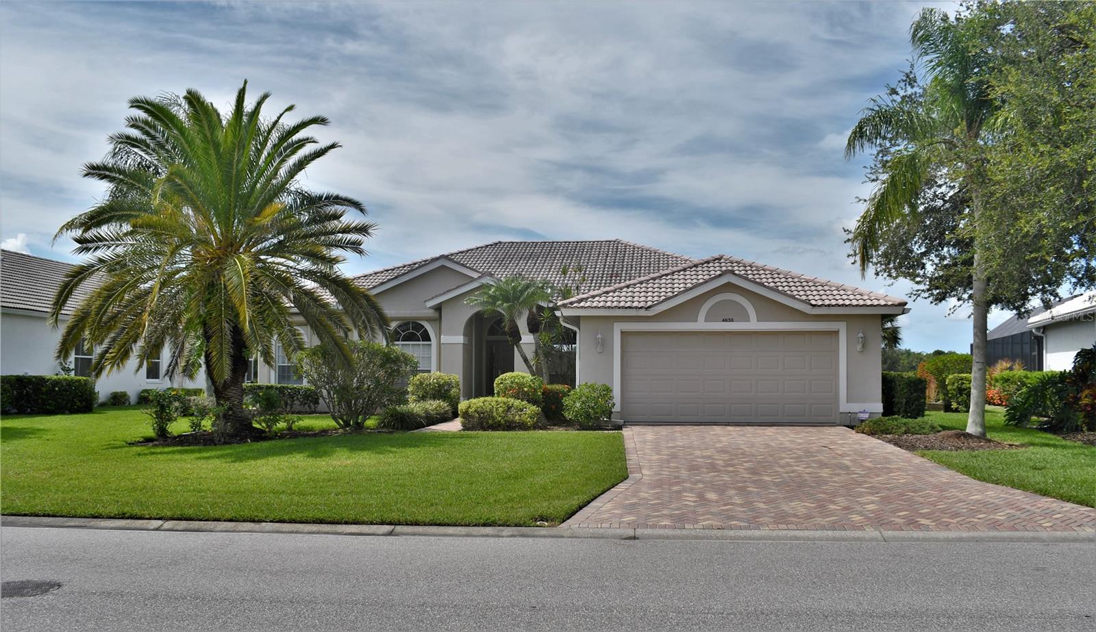 Booked through April 2025. - Escape to a world of refined luxury at this exclusive retreat within the prestigious Heritage Oaks Golf & Country Club. Enveloped by 24/7 guard service, this remarkable rental home in Sarasota, nestled on Florida's captivating Gulf Coast, presents an unrivaled opportunity for an unforgettable getaway. Emanating opulence, Heritage Oaks Golf and Country Club boasts an impeccably maintained championship golf course and an array of premier resort-style amenities, all crowned by an expansive 18,000 square foot clubhouse. As a guest, you'll enjoy unfettered access to this exceptional golf course, ensuring an immersive and elevated experience throughout your stay.
Step inside to discover a sanctuary where indulgence meets function. The meticulously designed interior showcases a thoughtful split floor plan that encompasses 4 bedrooms and 2 baths, providing ample space for relaxation and rejuvenation. Every corner exudes sophistication, offering a harmonious blend of style and comfort. Beyond the confines of the home, a private paradise unfolds. The exterior boasts a stunning pool, invigorating spa, and a thoughtfully appointed outdoor kitchen, all enveloped by abundant seating areas that invite you to bask in the scenic beauty of the golf course, seamlessly accessible from the screened-in lanai.
Positioned for ultimate convenience, this resplendent abode is mere steps away from the clubhouse, pro shop, cutting-edge fitness center, inviting community pools, and pristine tennis courts. Whether you seek leisure or recreation, every desire is effortlessly met.
For those yearning for the allure of the coast, the world-renowned Siesta Key Beach is just minutes away. Here, the promise of sun-soaked sands and tranquil waves awaits, granting you the ultimate beachside escape.
Elevate your concept of a perfect getaway as you enter the realm of Heritage Oaks Golf & Country Club. An exclusive rental home where lavish comfort, privileged amenities, and the charm of Sarasota's Gulf Coast merge to create an extraordinary escape. Your journey to an impeccable retreat begins here. The golf membership is transferable for a small fee.