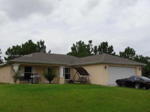 Photo of 2605 35th Street SW, Lehigh Acres, FL 33976 (MLS # TB8450591)