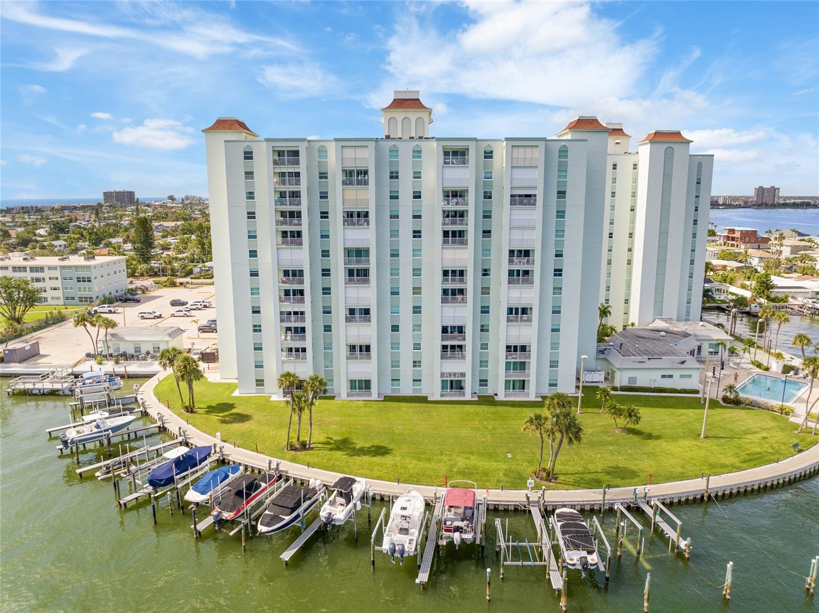 One or more photo(s) has been virtually staged. Live the Beach Life at Three Palms Point! Located just TWO blocks from the sandy shores of St. Pete Beach, this beautifully updated 2-bedroom, 2-bath corner unit is filled with natural light and showcases true pride of ownership.
Recent upgrades include New water heater 2025 and also a renovated primary bathroom shower including new vinyl plank flooring! A sleek glass walk-in shower for the 2nd bathroom in 2024, Granite countertops, sink, disposal and resurfaced cabinets in 2023, An inverted kitchen ceiling, new stainless steel appliances, paint, trim, lighting, window treatments and a water filtration system in 2022. Enjoy convenient same-floor laundry, a private storage unit and a deeded parking space #182. This well-managed, secure community offers resort-style amenities including gated entry, a heated waterfront pool, clubhouse with billiards, fitness center, sauna, shuffleboard, fishing pier, kayak/bike storage, and rentable boat slips. Unit is a great investment. It can be rented with a 3 month minimum lease. Whether you’re walking to nearby beaches, restaurants and shops or exploring downtown St. Pete’s museums, sports, and dining—this location offers it all. And with Tampa International Airport just a short drive away, you’ll love how easy it is to travel. This beautifully updated CORNER UNIT has been well maintained unit has a list of upgrades the current owner completed. Enjoy being a bike ride away from the beach! Live where others vacation—schedule your showing today!