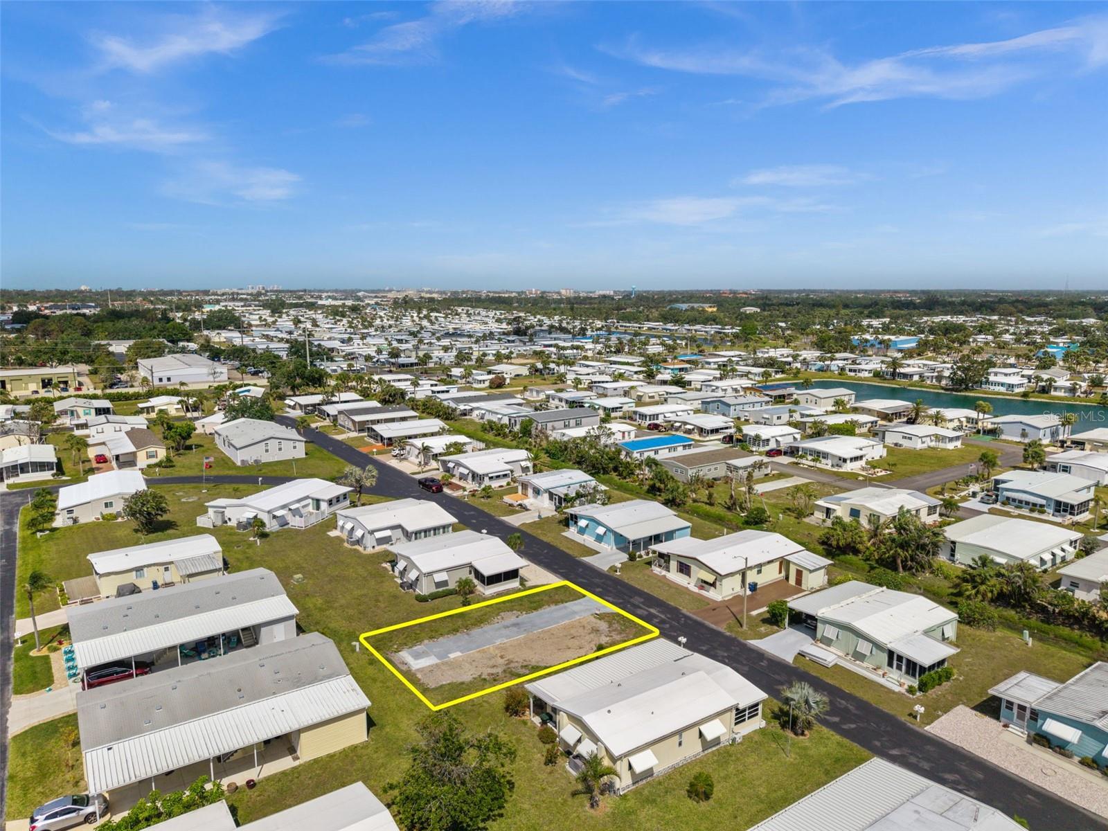 Welcome to Your Perfect Lot in Sandalwood Park! Located in the sought-after 55+ community of Sandalwood Mobile Home Park, this well-positioned lot with a paved driveway is your blank canvas for a brand-new home. Whether you're looking to settle in year-round, enjoy it seasonally, or invest now for your future retirement, this is a rare opportunity to own a clean slate in one of the area’s most active and welcoming communities. Sandalwood Park offers a laid-back Florida lifestyle with low quarterly fees and a variety of ways to stay social and active. Residents enjoy access to a heated swimming pool, shuffleboard courts, a putting green, bocce ball, horseshoes, and regular community events that bring neighbors together. Conveniently located near downtown Venice, you’ll enjoy easy access to charming shops, local dining, cultural attractions, and the stunning Gulf beaches. The park is also pet-friendly (with size and breed restrictions) and features its very own dog park. Come experience the vibrant yet easygoing charm of Sandalwood Park. This is more than just a lot—it’s the beginning of your next chapter in sunny Florida.
