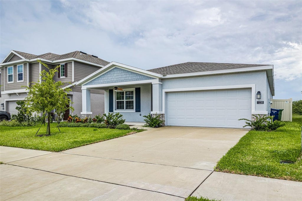 Photo of 1228 Tyler Loop, Winter Haven, FL 33884 (MLS # L4964806)