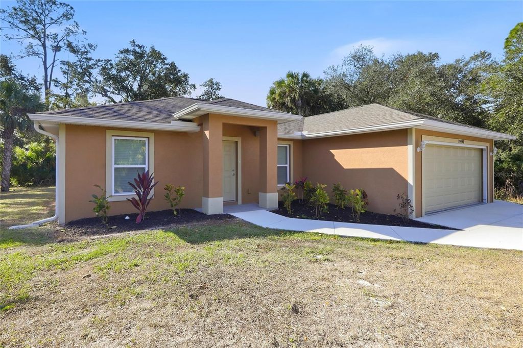 Photo of 19095 Roosevelt Avenue, Port Charlotte, FL 33954 (MLS # C7521056)