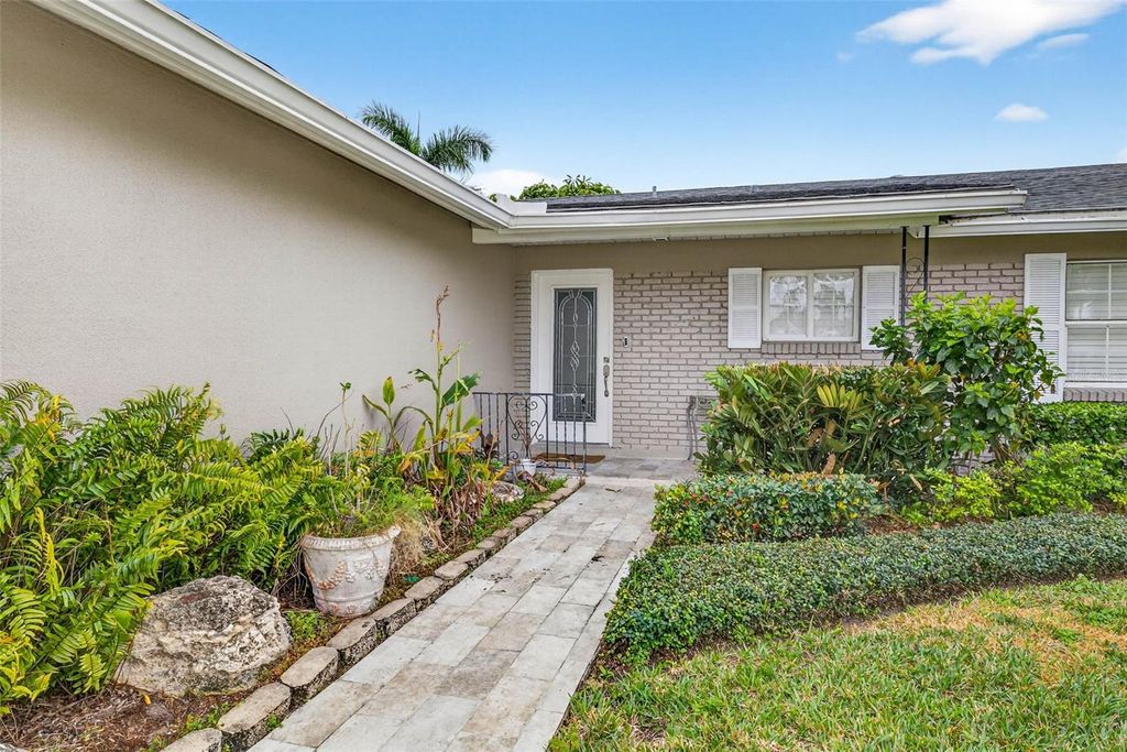 Photo of 8718 Tahiti Lane, Tampa, FL 33615 (MLS # TB8469298)