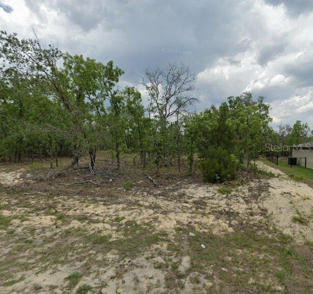 Lot for Sale in Citrus Springs Great Location!! Features:PRUR/RURAL RESIDENTIAL Zoning, Ideal for single-family homes. This lot provides the perfect setting to build your dream home. Great Lot: At 0.24 acres well-suited terrain makes this lot perfect for builders and developers, ensuring an easy and cost-effective construction process. Community Amenities:No HOA Fees: Enjoy complete freedom with no restrictive rules or additional costs.Recreational Facilities: Access to tennis courts, playgrounds, and a golf course, perfect for maintaining an active and healthy lifestyle.Accessibility and Location:Major Highways: Conveniently located near US-41 and FL-40, offering easy access to surrounding areas. Urban Centers: Close to Tampa, Orlando, beaches, and natural parks, providing endless entertainment and leisure options. Distances to Tourist Attractions:Gulf of Mexico Beaches: Just about an hour drive to gulf coast beaches, great for weekend stay