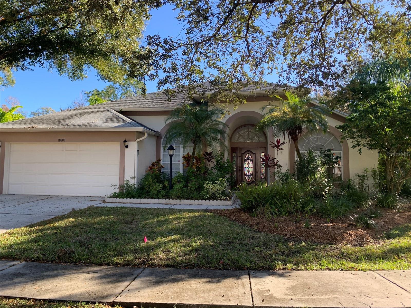 Westchase house for rent! This home located in the back of the Keswick Forest section of Westchase and is situated on a large corner / cul-de-sac lot backing to peaceful conservation! This pool home offers a large screened lanai with a built in outdoor kitchen, pool with built in spa and fully screened pool area. Inside the home offers multiple living spaces including a formal dining area as well as a dinette overlooking the conservation, formal and informal living spaces and 3 bedrooms. The master suite is extra spacious boasting a sitting / reading area, walk in closet with built ins and double door entry to the master bath which includes a double vanity, garden tub, walk in shower and water closet. The second and third bedrooms have immediate access to a second full bath. Additionally this home offers a bonus room immediately off the foyer with library doors and a view facing the front of the home making it perfect for use as a home office. Rental insurance is required. Security deposit $3500.00.