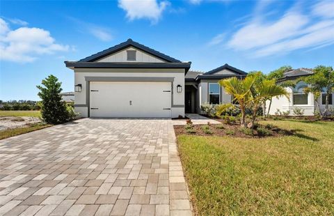 Photo of 10313 Spruce River Way, Parrish, FL 34219 (MLS # TB8407764)