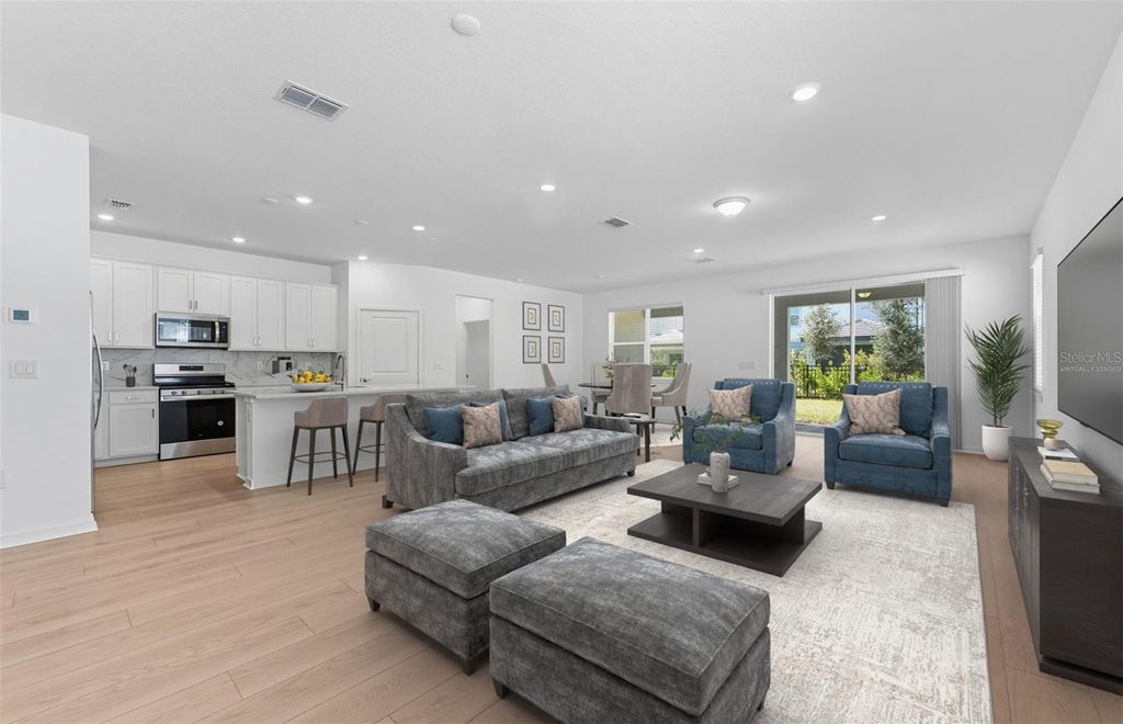 Photo of 10313 Spruce River Way, Parrish, FL 34219 (MLS # TB8407764)