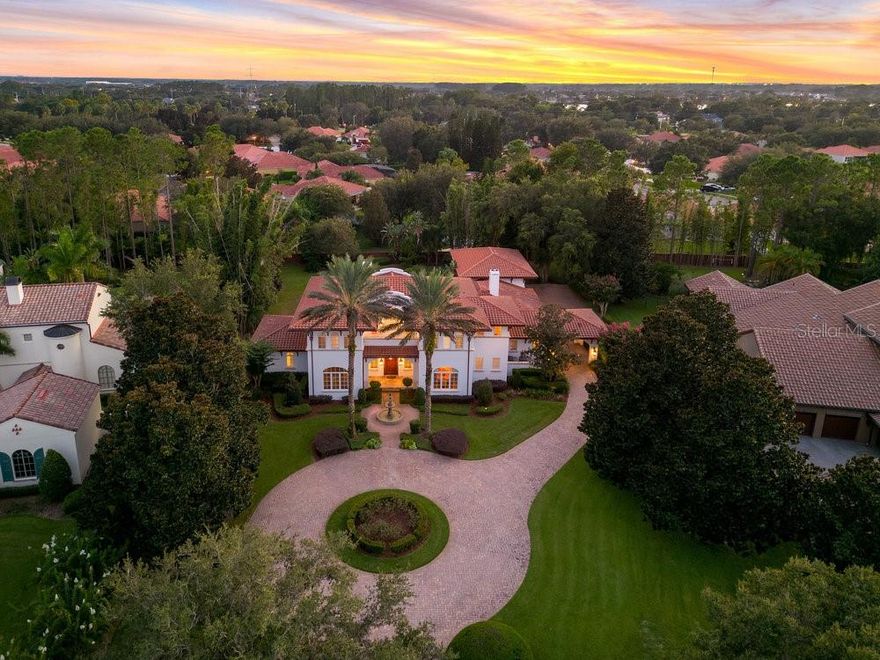 Welcome home to your magnificent custom estate poised on an acre lot on one of the most prominent streets in Central Florida. The estate was constructed by award-winning Derrick Builders who is a select builder at Disney’s Golden Oak community. This captivating home totaling close to 9,000 sq ft offers timeless architectural masterpiece with its stately well balanced curb appeal showing an unparalleled attention to details on quality & perfection that includes pristine manicured grounds. You and your guests will be greeted with a large circular driveway, two grand palms, three tier stone fountain, and a stately solid mahogany wood door at the entrance. Prepare to be mesmerized upon entering with the attention to detail throughout including rich stone flooring and a welcoming living room with soaring high ceilings including plenty of windows that flood the home with natural light. The right vestibule leads to an elegant dining room with gorgeous drapery, 300+ bottle wine cellar, and a butler’s pantry. The fully equipped gourmet chef’s kitchen open to the family room and large dining nook is a dream with a large center island, breakfast bar seating, custom Busby solid wood cabinetry, stone countertops, pot filler, walk-in pantry, Wolf appliances including a natural gas six burner range, separate built-in oven, microwave, matching panel Sub Zero refrigerator and dishwasher. The porte-cochere will make your life easy with drop-off and pick-ups just beside the kitchen. Master bedroom suite is located on the main level on the east wing offering the ultimate privacy & tranquility with easy access to your pool. The spa like master bathroom includes an enclosed rain shower, jetted tub, dual vanities, and two walk-in closets. Adjacent to the master suite is your private study with wood floors and custom shelving. There is an additional guest room on the main level making it ideal for visitors or family. Above the three garage is a huge game room/in-law suite with its own wet bar and full bathroom. The solid wood staircase leads you upstairs to the loft with a massive terrace overlooking the pristine grounds and pool. Secondary bedrooms are all en-suite with plenty of closet space. Laundry is conveniently located one at each level. Your home has an amazing outdoor space with a heated saltwater pool & spa, screened in summer kitchen with grill, and two covered lanais. The outdoor space can entertain hundreds or just your close loved ones with lush mature landscaping offering the ultimate sense of privacy from within your fenced backyard. Additional features include a three-car garage with your own motor court. Reserve at Lake Butler Sound is 24-hour guard gated neighborhood with an additional back gate providing easy access to Windermere Preparatory School. Location is close to Orlando’s major attractions, shops, restaurants, and “A” rated schools. Be prepared to enjoy the extraordinary lifestyle this estate offers! Don't forget to click on the virtual tour links. 




<iframe width='853' height='480' src=https://my.matterport.com/show/?m=kvYAV4aKawR
></iframe>