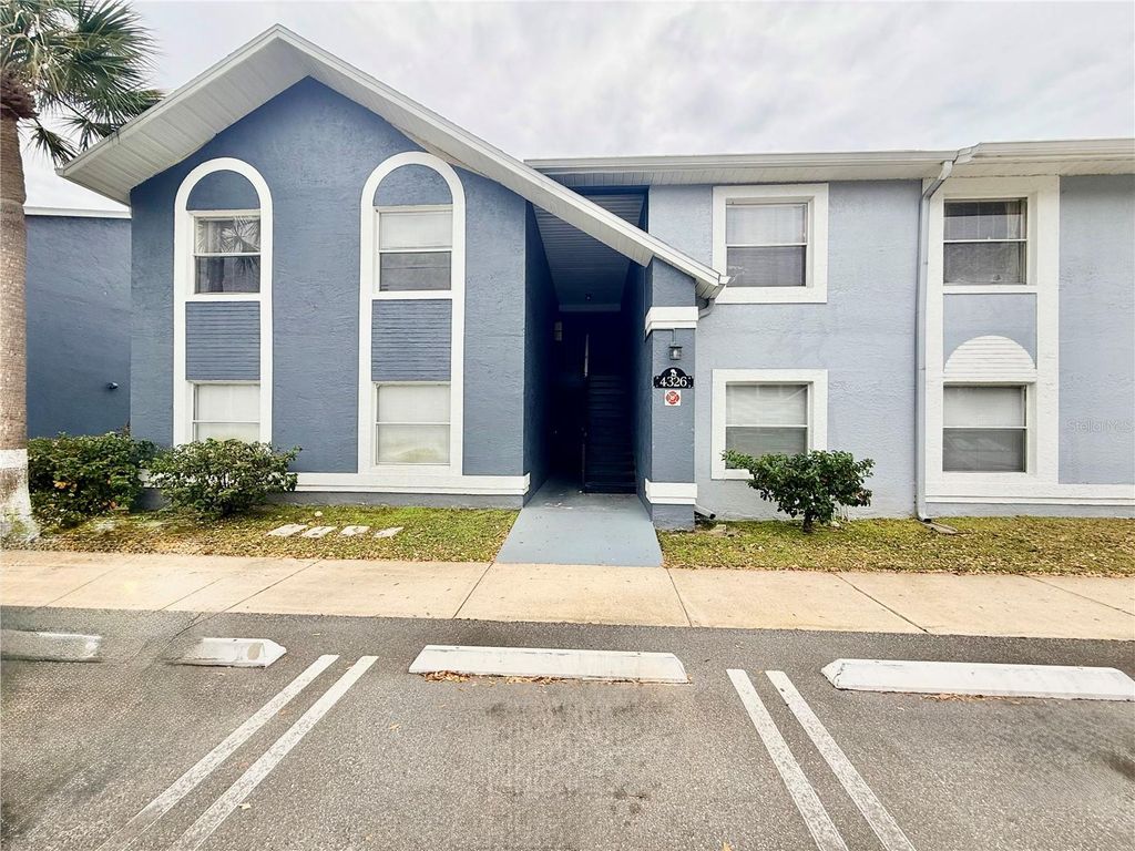 Photo of 4326 Pershing Pointe Place #3, Orlando, FL 32822 (MLS # O6387255)