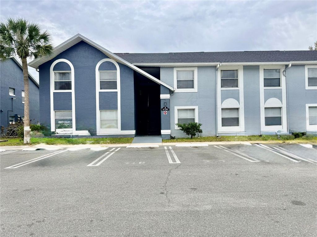 Photo of 4326 Pershing Pointe Place #3, Orlando, FL 32822 (MLS # O6387255)