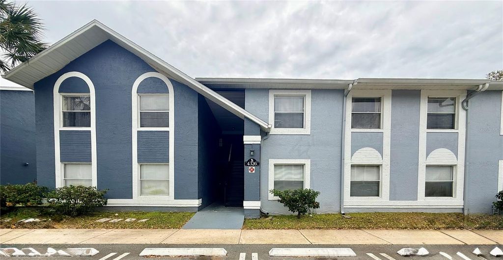 Photo of 4326 Pershing Pointe Place #3, Orlando, FL 32822 (MLS # O6387255)