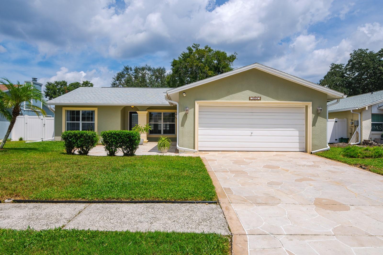 One or more photo(s) has been virtually staged. Welcome to your new pool home in the desirable Settlers Point neighborhood of Tampa. This beautifully maintained 3-bedroom, 2-bathroom home offers 1,692 square feet of living space with a split floor plan designed for both comfort and functionality. From the moment you step inside, vaulted ceilings and an open layout create a bright, inviting atmosphere that makes the home feel even more spacious. The heart of the home is the newly remodeled kitchen, featuring popular brown shaker-style cabinets, white quartz countertops, and stainless steel appliances. Its clean, modern design blends seamlessly with the open-concept living and dining areas, making it an ideal space for gatherings with family and friends. A large family room extends the living space, providing plenty of room for entertaining. The master suite is a true retreat with French doors that open directly to the backyard and pool area. A generous walk-in closet with a custom shelving system keeps everything organized, while the private en suite bathroom completes the space. Two additional bedrooms and a second full bathroom are thoughtfully situated on the opposite side of the home for added privacy. Step outside and discover your own private oasis. A covered patio is the perfect spot to enjoy morning coffee or evening dinners outdoors, and just beyond awaits a sparkling saltwater pool. The fully fenced backyard requires no grass maintenance, allowing you to spend more time enjoying the Florida lifestyle instead of yard work. All major updates have already been taken care of, including a new roof (2025), new water heater (2025), HVAC system (2019), and pool pump (2024). With no carpet throughout and a two-car garage for convenience, this home is truly move-in ready. Settlers Point is a well-established neighborhood with no HOA, giving you the freedom to enjoy your home without added restrictions or fees. Its location offers quick access to shopping, dining, and entertainment, as well as easy routes to I-275 so you can take advantage of all the events and attractions Tampa has to offer. Just outside famous Lake Magdalene and within one of Tampa's BEST school districts. Homes like this—featuring a private pool, updated systems, and no HOA—are hard to find in today’s market. Don’t miss your opportunity to make this Tampa gem your own. Home is located in a Non-Flood Zone. Schedule your private showing today!