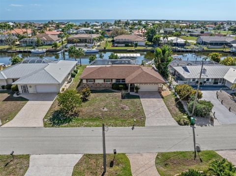 Photo of 109 Peckham Street SE, Port Charlotte, FL 33952 (MLS # C7523183)