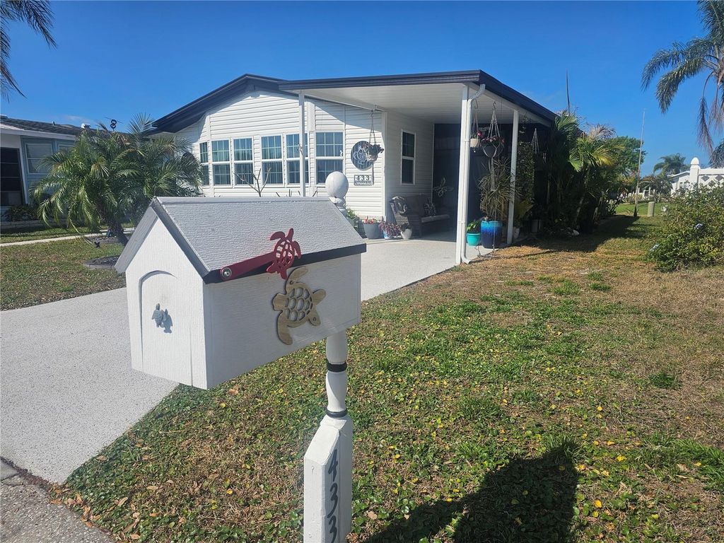 Photo of 433 Sailfish Boulevard, Oldsmar, FL 34677 (MLS # TB8481608)