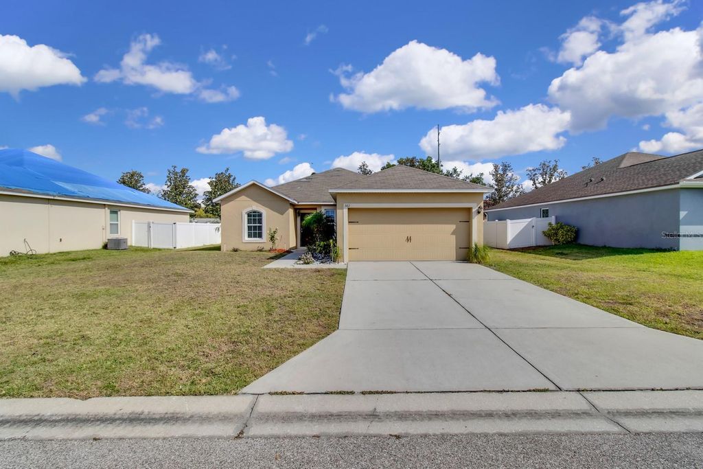 Photo of 561 Lake Cummings Way, Lake Alfred, FL 33850 (MLS # S5126539)