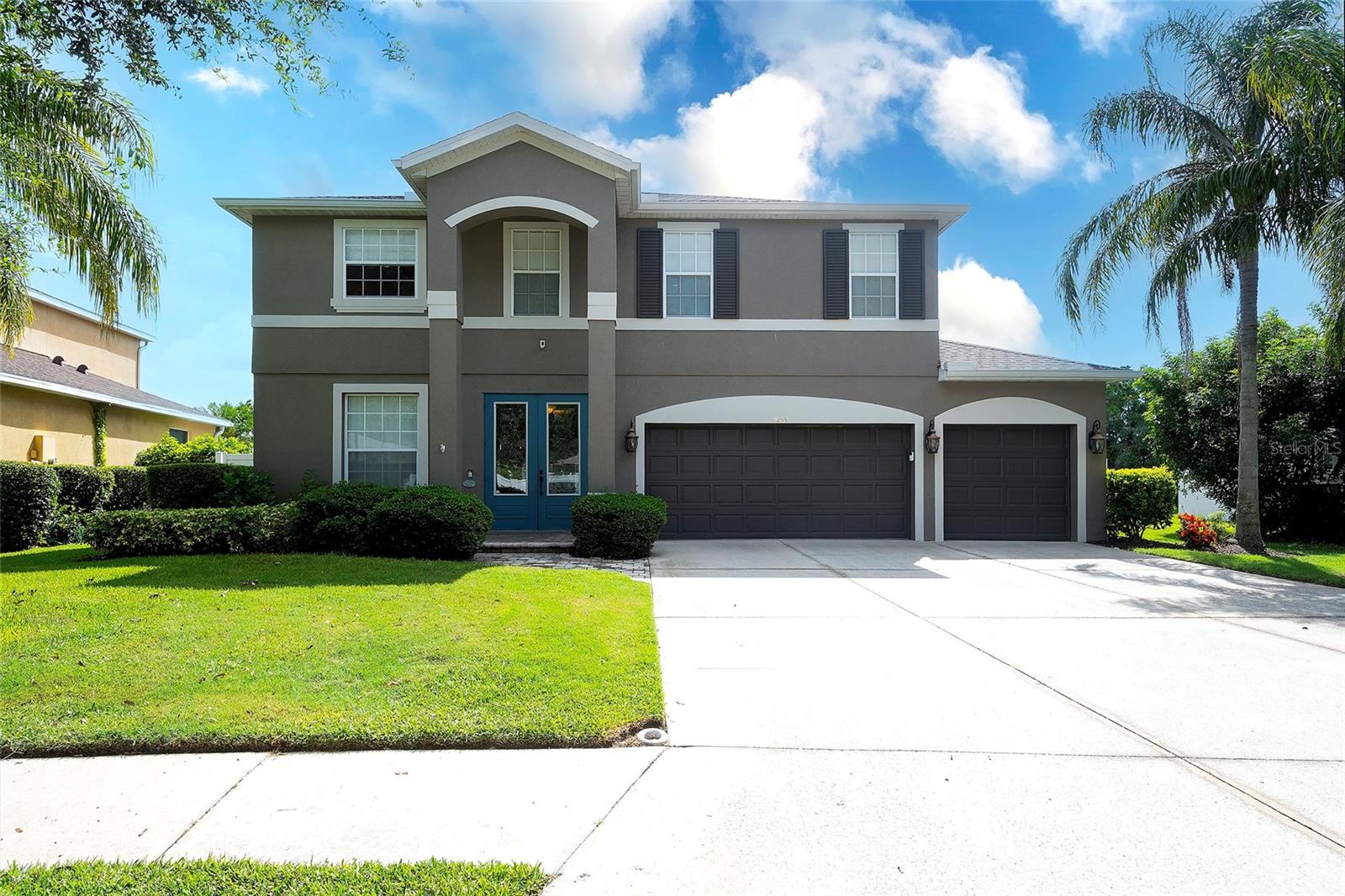 A must see masterpiece in Barrington Ridge! Step into your Florida dream home where every detail has already been handled, and all that’s left is YOU! This immaculate property blends luxurious updates, smart tech, and serene views into one unforgettable lifestyle package. Features that WOW: 3 year old roof with gutters, 2 air conditioning units, one 4 years old, and one 9 years old, hurricane impact windows, 3 car garage with MY Q app. garage door opener, keypad with camera, ring doorbell, 2 cameras in front of the house, and one camera in the pool enclosure. 5 zone irrigation system. Ultimate backyard Oasis: 15 x 36 custom pool with sun shelf and waterfall. 2 Pentair LED lights replaced 2024. Intellchlor salt system, new filter 2023, pool heater 2021, pool pump replaced 2023, Lanai Lights added 2022. Screen enclosure with flagstone pavers and doggie door. Outdoor shower with enclosure and changing area added 2021. Guardian alarm system wired and monitored on all windows and doors for motion. Fenced in back yard! Chef’s Dream Kitchen: Custom Kitchen with wood cabinets, quartz countertops, soft close drawers, extended island with extra storage below, and a wine refrigerator. Tiled backsplash. Dishwasher replaced 2025. Office carpet replaced 2025. Custom SPF light filtering shades installed, to keep the heat out, and let the light in! Interior Highlights: Upstairs you will find the loft area with sliding glass doors leading out to a generous balcony for your morning coffee, sunrise, and views of mother nature as you gaze across the large pond and preserve! Primary bedroom with ensuite bathroom, custom cabinets, separate large tub and shower, 2 custom designed walk-in closets. Second primary with ensuite bathroom. Custom cabinet, quartz countertop and tiled shower. The third full bathroom with double sinks and tub to service the other two bedrooms. Community Perks: Barrington Ridge offers a community pool, a park and a playground. You won’t find any CDD fees here! And Barrington Ridge is centrally located to Sarasota airport, world class beaches, many restaurants, first class shopping at University Town Center, I-75 connecting you to Sarasota, St. Petersburg, Tampa and Orlando.