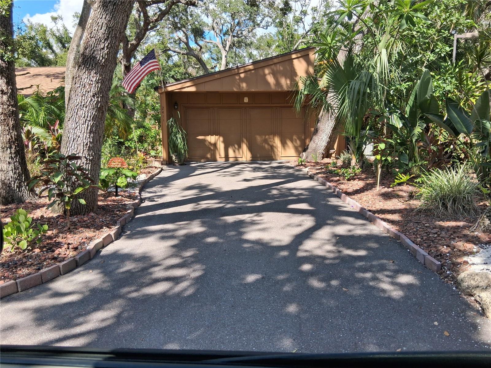 A very unique property located in West Bradenton, minutes to the Gulf of America beaches on Anna Maria Island, shopping and restaurants, with medical facilities. This single family home is located in the Tanglewood Bird and Wildlife Sanctuary, with lots of shade trees and lush tropical plants. It's a quiet peaceful neighborhood for your utmost in Florida living. The home features a nice open floor plan with a vaulted ceiling and lots of natural light. The kitchen features deluxe white cabinets and stainless steel appliances. There is an eat in bar area as well as a dining area open from the kitchen. The bedrooms are all a good size and the 3rd bedroom features an off shoot office area with a door to the outside. This office is presently used as the owner's art studio. Then comes the spacious lanai area with high ceilings and great view to the tropical back yard. There is a community pool and tennis court. Contact us today to schedule a viewing of the Florida lifestyle that awaits you in this fine home.