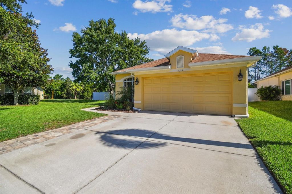 Photo of 11125 Shelter Cove Loop, New Port Richey, FL 34654 (MLS # TB8400692)