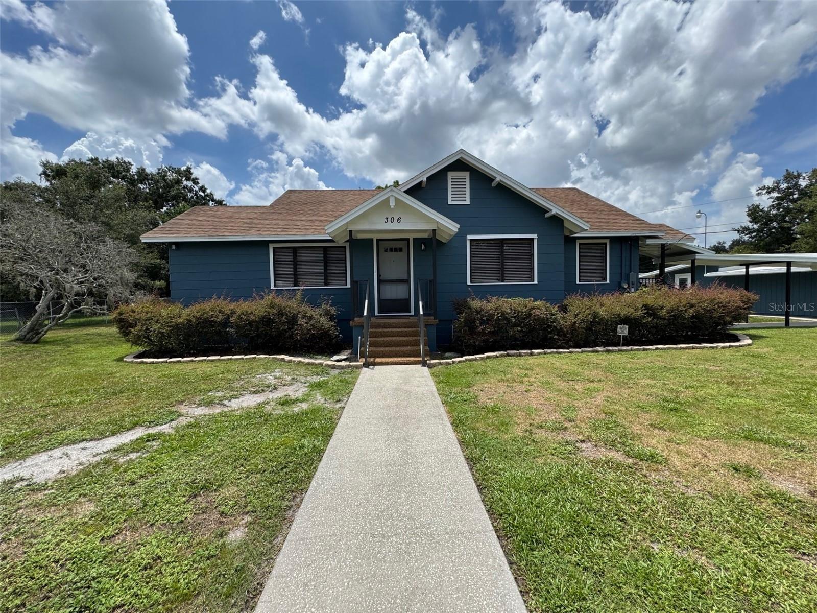 Fully Renovated Gem on Over Half an Acre – Endless Possibilities!! Step into this beautifully remodeled 3-bedroom, 2-bath home nestled on a spacious 0.5+ acre lot in the heart of Lakeland. Every inch of this property has been thoughtfully updated—from the brand-new plumbing and electrical systems to the tankless water heater and modern kitchen appliances. Even the washer and dryer are fresh out of the box! The home has a detached garage with workshop for hobbies. The home also has a separate shed for storage. No HOA!! which means you can bring your RV, boat or other "toys"!!. Located on the back of the main house is a fixer-upper ADU (Accessory Dwelling Unit) ready to be transformed into a 2-bed, 1-bath guest house with its own kitchen and living area. Mature trees and open yard space are perfect for creating your own private paradise. Enjoy peaceful mornings with birdsong and tranquil afternoons under the shade. Whether you're dreaming of a garden, pool, or outdoor entertaining area—this lot has room to grow. With its prime location the home is centrally located between Orlando and Tampa, minutes from Lakeland Regional Hospital, schools, and the post office. The home is less than 2 miles to I-4 and major roads. This home is move-in ready with room to expand, invest, or simply enjoy. Don’t miss your chance to own a slice of Florida paradise—schedule your showing today!!