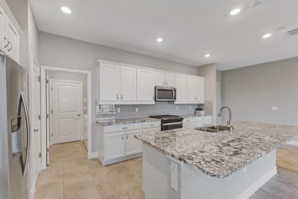 Photo of 5597 NW 45th Lane, Ocala, FL 34482 (MLS # OM714404)