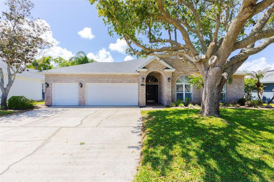 New Roof, New A/C, New Appliances! Finally you have found the Port Orange swimming pool home that checks all of your ''must-have'' boxes! As you approach this ICI-built executive residence in highly-coveted Countryside West, a winding live oak shades the front yard, with curbed landscaping, and an elegant brick elevation behind. Inside this spacious floor plan, soaring ceilings and large windows allow Florida sun to brighten all gathering spaces, creating comfort and versatility for new or growing families. Hardwood flooring is found through the main living areas, while the chef of the family will take note of the abundant kitchen featuring granite countertops, stylish wood cabinetry, and stainless steel appliances, including a double oven. All four bedrooms enjoy volume ceilings and ample storage, while the oversized primary suite provides a large private bath with dual vanities, a walk-in shower, and a soaking tub. A massive bonus room leads out to a poolside oasis, complete with a pavered deck, blooming Florida foliage, and a full privacy fence. Unwind each evening from the large, salt-water chlorinated swimming pool area and enjoy the peace of mind in knowing that major home costs (New Roof 2023, New A/C 2024) have already been taken care of. Plus, inside the oversized 3-car garage you will even find a 50-Amp Power Inlet Box for a generator. Countryside West is located in the heart of all that Port Orange has to offer, including award-winning public schools, the city center, shopping, dining and more. Don't miss out on this rare find in Port Orange.