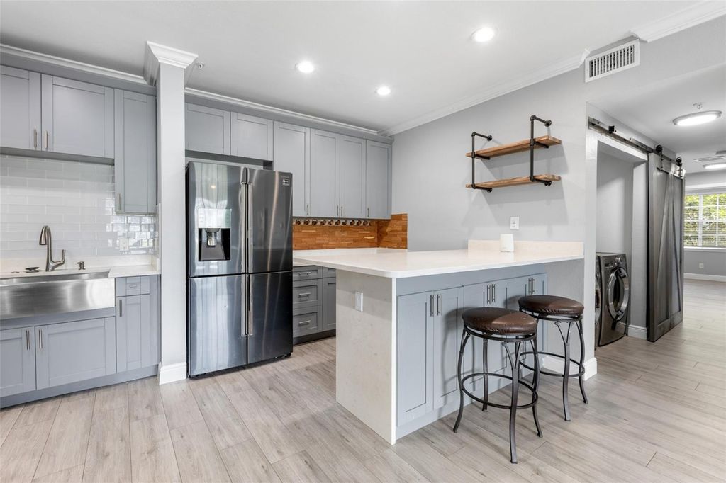 Photo of 12934 Sanctuary Cove Drive #104, Temple Terrace, FL 33637 (MLS # TB8419554)
