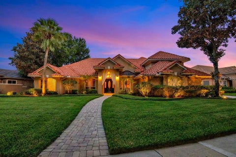 Photo of 7718 Debeaubien Drive, Orlando, FL 32835 (MLS # O6410511)