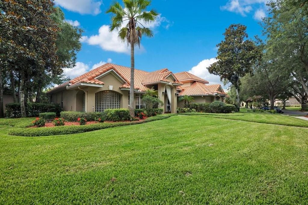 Photo of 7718 Debeaubien Drive, Orlando, FL 32835 (MLS # O6410511)