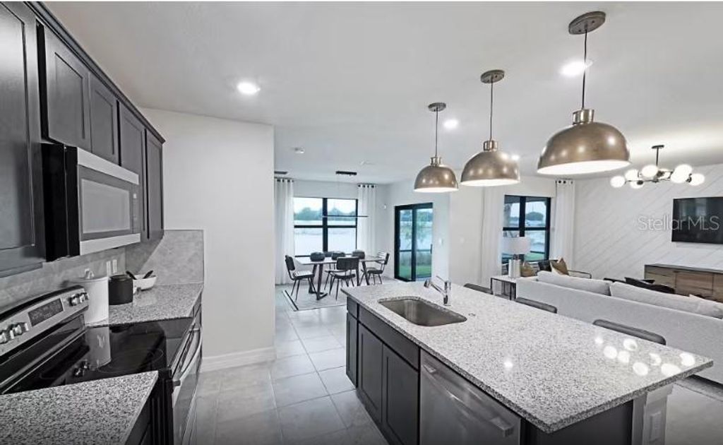 Photo of 10779 Sun Drop Street, Venice, FL 34293 (MLS # TB8439668)
