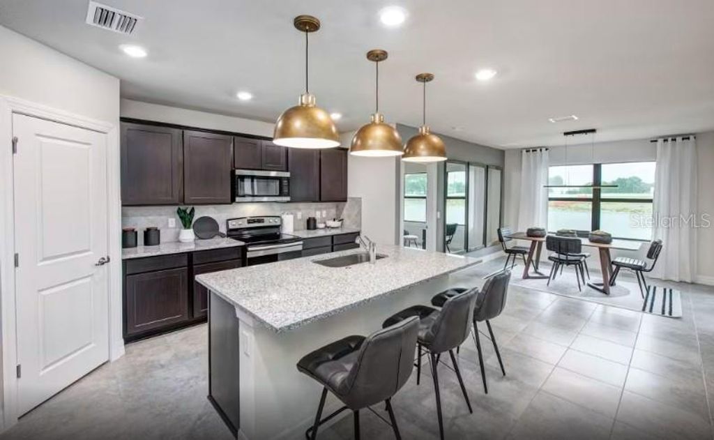 Photo of 10779 Sun Drop Street, Venice, FL 34293 (MLS # TB8439668)