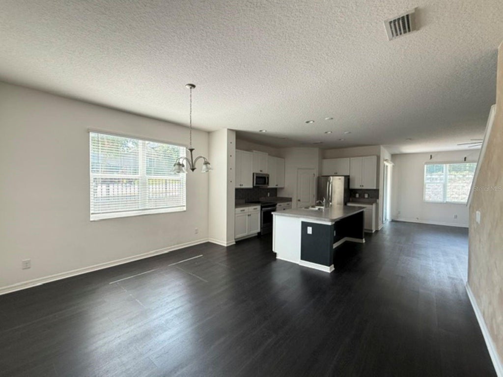 Photo of 9704 Early Loop, Groveland, FL 34736 (MLS # OM728505)