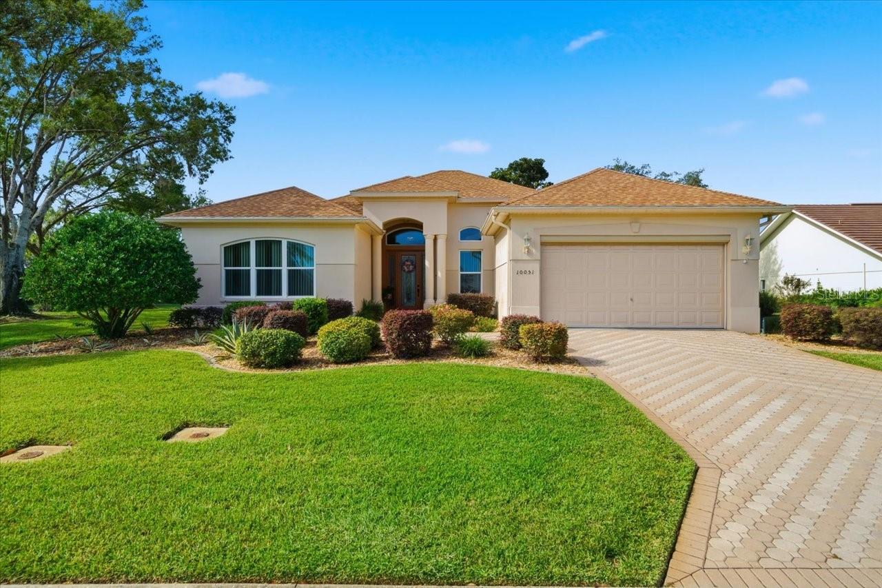 Located in Glen Lakes, this 1998 Addison Osprey home has been impeccably maintained. Situated on a corner lot on .3 acre, it has lush landscaping, Curb-a-Lawn and rock in the landscape beds. The garage has screen. Paver drive/walkway/Florida Room. NEW HOT WATER HEATER IN 2025. NEW ROOF IN 2022. FRESHLY PAINTED IN 2020. NEW DOUBLE PANE SLIDERS AND WINDOWS IN 2017.  Beautiful entry door with sidelights. 3 bedrooms+Florida Room/2 baths/2 car garage. Living room with formal dining room. There are lighted shelves in the living room for showcasing your collections or artwork. The kitchen has white cabinets, beautiful granite counters and backsplash, breakfast bar, closet pantry. The large breakfast nook has new (2023) coffee bar. The comfortable primary suite has large walk-in closet,  large bath with double sinks, walk-in shower with separate tub. The 3rd bedroom has French door entry and  is currently being used as a den with built-in Murphy bed, but it does have a closet for a true bedroom. The laundry room has a sink, cabinets and washer/dryer.  The large (10 ft. by 33 ft.) Florida room is perect for year 'round living with glass enclosed walls, beautiful paver flooring and is under heat and air. This is a very light and airy home with  lots of windows and 10 ft. and 12 ft. high flat ceilings. All appliances lincluded. Deep irrigation well for exterior landscaping and lawn which helps save on the water bill. 2655 living sq. ft., 3215 total sq. ft. HOA FEES INCLUDE CABLE AND HIGH SPEED INTERNET AND PRIVATE MAINTAINED STREETS, 24 HOUR SECURITY WITH MANNED GATE. Glen Lakes is a wonderful gated and manned golf course community and surrounded by the 85,000 acre Chassahowitzka National Wildlife Refuge. The required social membership gives access to the clubhouse, restaurant, bar, Jr. Olympic size heated pool/spa, fitness center, clay tennis courts, pickleball courts and a vast array of social clubs. Golf memberships also available.