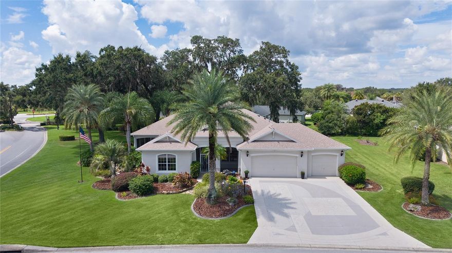 Experience the essence of “Living the Dream” in this meticulously maintained 3-bedroom, 2-bath Williamsburg PREMIER HOME, perfectly situated in the highly sought-after Village of Bridgeport at Lake Sumter. Located in Florida’s most desirable golf community—FURNISHED and/or TURNKEY optional, with NO BOND, this home offers timeless elegance and modern upgrades, including a newer roof (2022), freshly painted interior, stainless steel appliances with a new microwave (2025), dishwasher (2025), and a newer refrigerator (2023). Granite countertops, NO CARPET, and a versatile bonus room off the primary suite (ideal for an office or gym) add to the appeal. The thoughtfully designed split floor plan is perfect for entertaining, featuring a kitchen that flows seamlessly into the spacious dining and living areas with soaring 10-foot ceilings. The living space opens onto a wraparound patio overlooking lush landscaping and mature trees, enhanced by extensive exterior lighting, an inviting setting for both relaxation and gatherings. The primary suite impresses with tray ceilings, dual walk-in closets, and a spa-inspired en-suite bath offering dual vanities, a Roman shower, and a luxurious garden tub. Additional highlights include a garage designed to accommodate two cars plus a golf cart, a painted driveway with ample parking, electric garage screen door, ROOM FOR A POOL and updated plumbing fixtures (2025).  This home is in a prime location just 3 minutes from Lake Sumter Landing Square and 1 minute from Palmer Country Club & Golf Course & top tier practice facilities and Bridgeport Pool, this property perfectly blends convenience, lifestyle, and elegance. Schedule your private tour today and make this dream home yours!